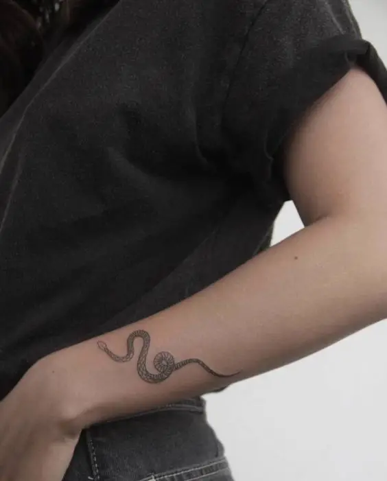 Minimalistic snake tattoo 2