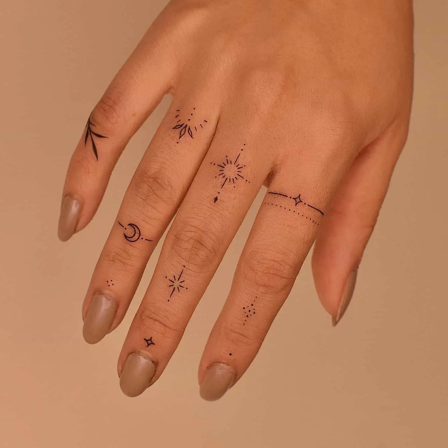 Mini finger tattoo by tattooer jina