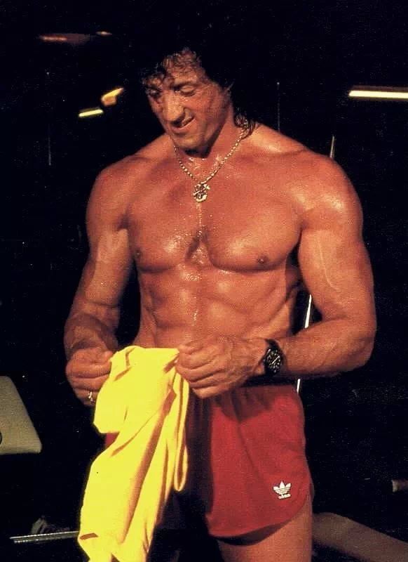 MALE CELEBRITIES: Sylvester Stallone shirtless in red shorts