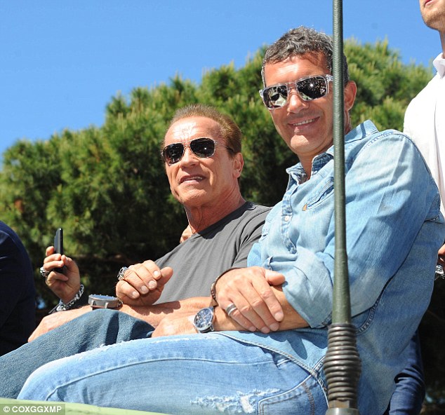 He's a Desperado! Antonio Banderas, 53, sat next to Schwarzenegger on the military vehicle