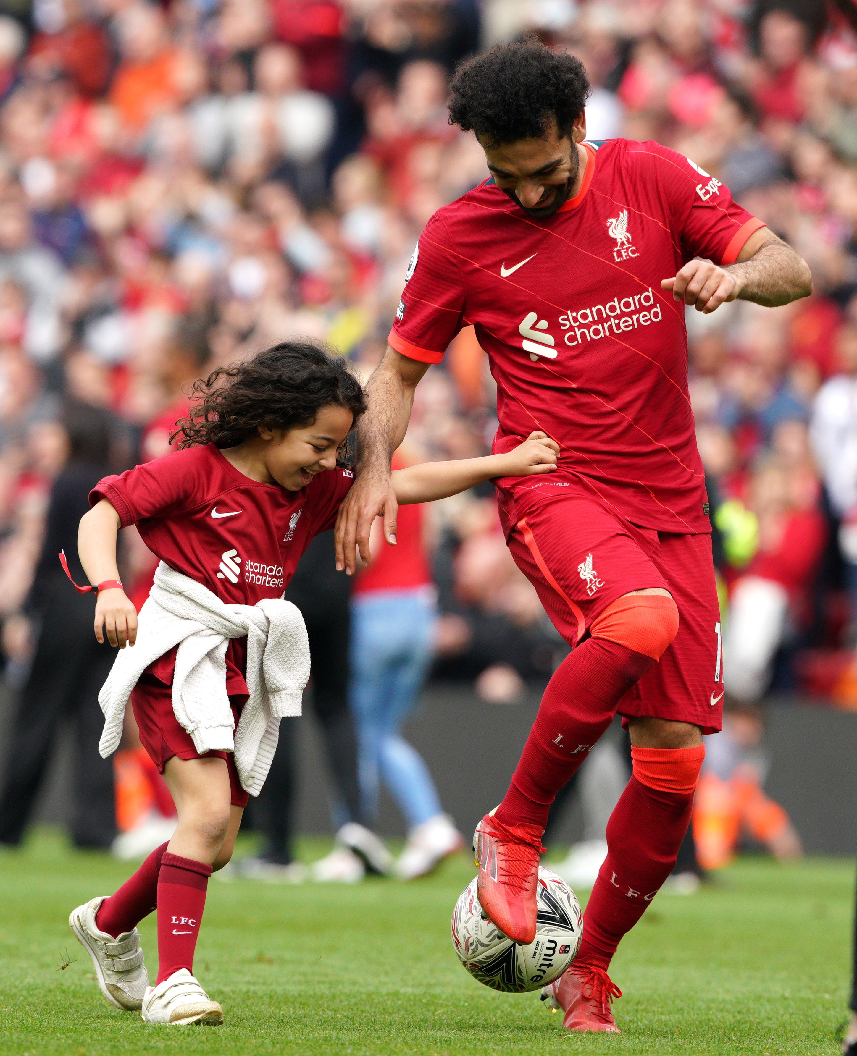 Mohamed Salah's daughters star on the pitch at Anfield - in pictures