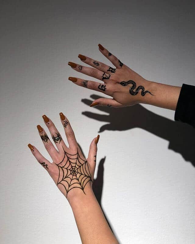 Spider Web Hand Tattoo