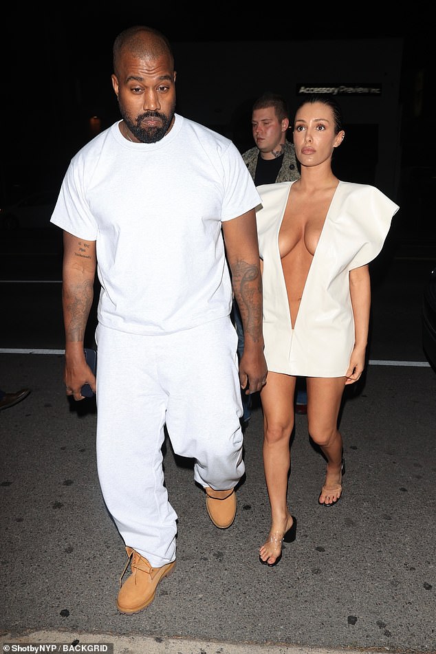 Kanye West's wife Bianca Censori used his ex Kim Kardashian as her style inspiration once again as she stepped out in a white dress previously worn by the star