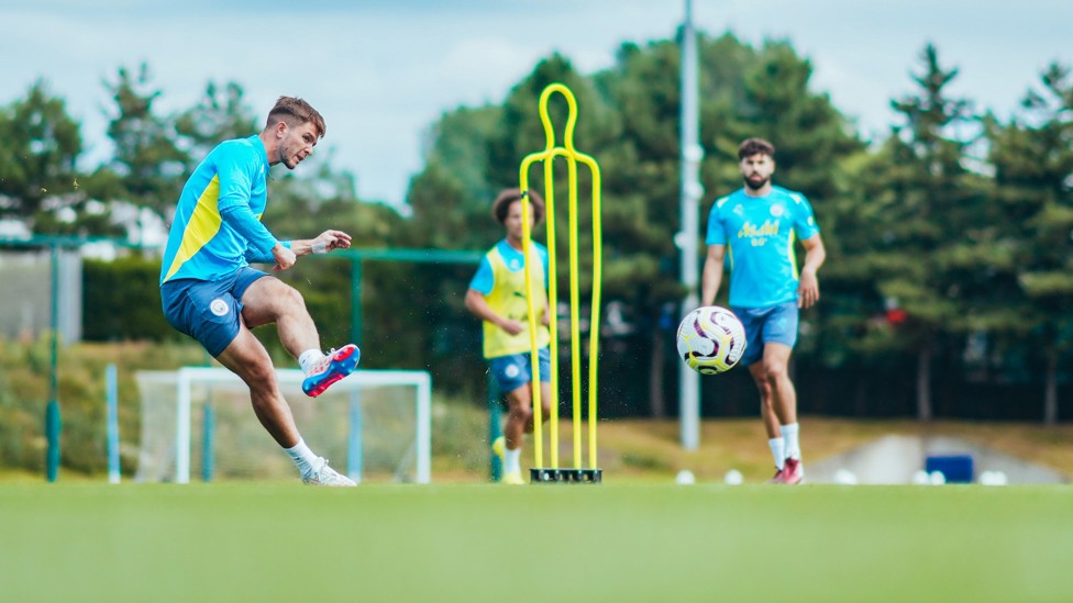 SHOOTING DRILLS : James McAtee looks to curl an effort into the top corner. 