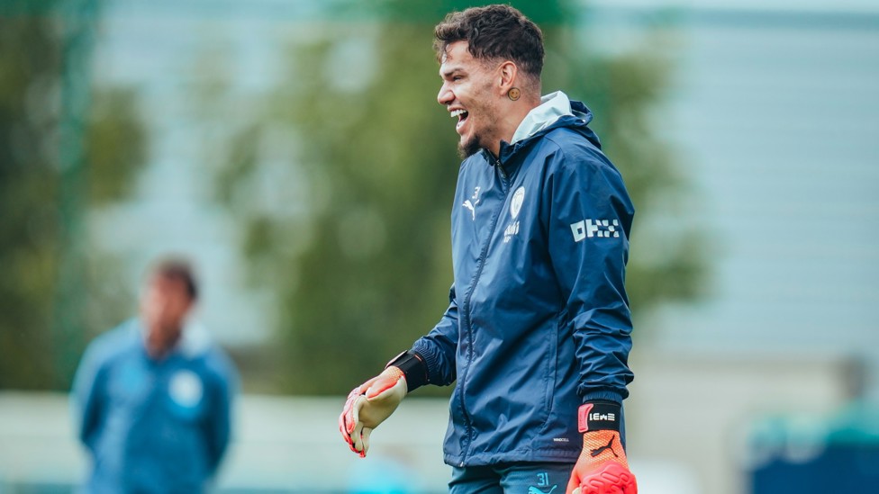 :)  : Ederson enjoying training. 