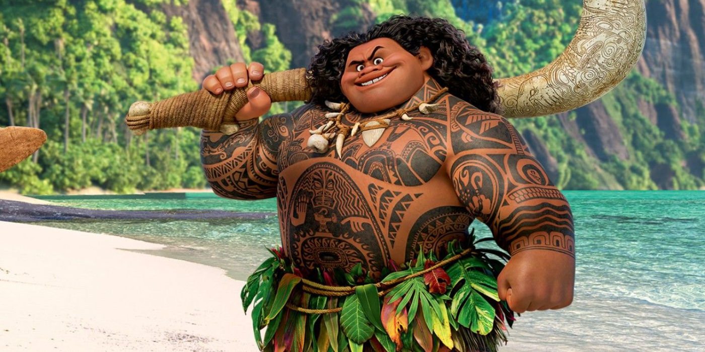 Maui Smiling By The Ocean With all His Tattoos in Moana