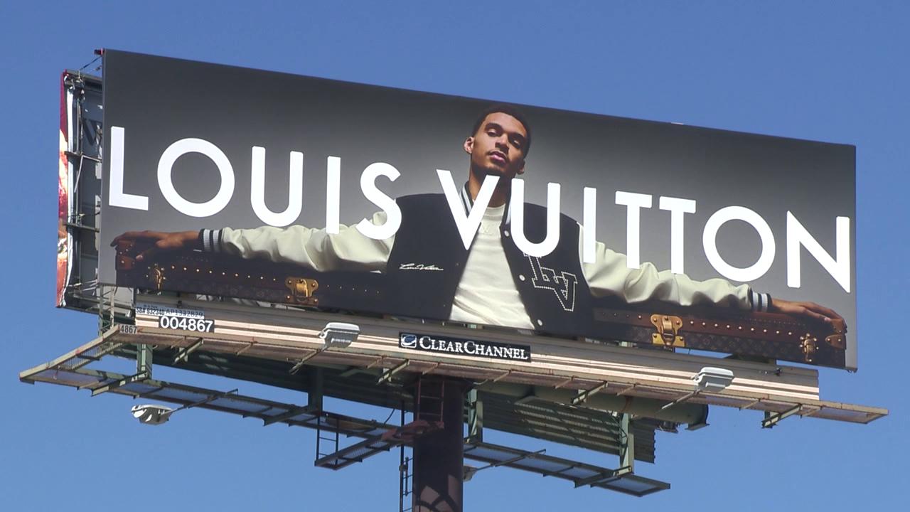 Spurs' Victor Wembanyama featured on Louis Vuitton billboard on South Side